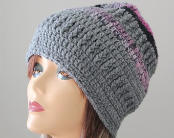 May include: Gray crocheted beanie with pink and black stripes.