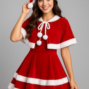 May include: Red velvet Santa Claus costume set. Includes a dress with white trim, a matching capelet, and a Santa hat with a white pom-pom. The outfit is designed for a festive holiday look.