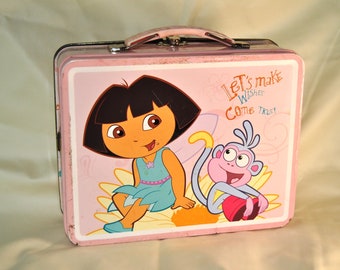 Vintage Dora the Explorer Metal Tin Box As Is Childhood Cartoon Character Collectible Y2K 2000s Pink Mini Lunchbox Storage 7.5 x 6 x 2.75