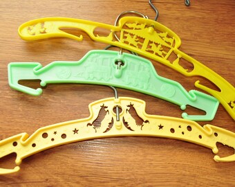 Vintage Home Decor Baby-Childrens Plastic and Metal Clothes Hangers Destash set of 3 Train Circus Cow & Moon 90s 70s Display Yellow Green