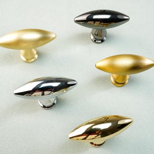 シンプルなオリーブスタイルのノブドレッサー引き出しハンドルプルキッチン食器棚キャビネットプルゴールドドアハンドルクローゼットワードローブクロームノブハードウェア