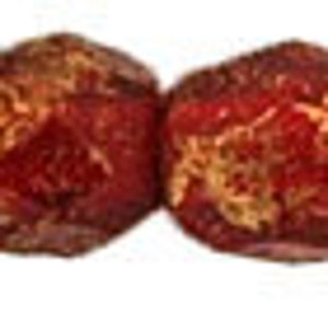 May include: Five red and brown round beads with a mottled texture.