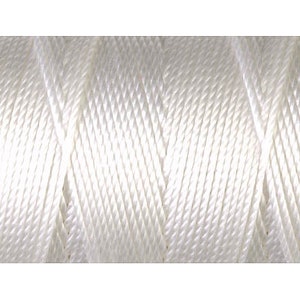 May include: White nylon cord, a type of string used for crafts and jewelry making.