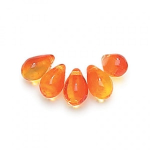 May include: Five teardrop-shaped, translucent orange beads are arranged in a semi-circle. The beads have a glossy finish, reflecting light and creating highlights. The beads are likely for jewelry making or crafting.