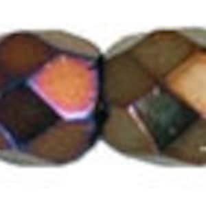 May include: Four iridescent brown and green faceted glass beads. The beads have a metallic sheen and are approximately 6mm in diameter.