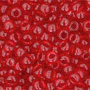 May include: A close-up image of a large quantity of small, red, round beads. The beads have a slightly iridescent finish.