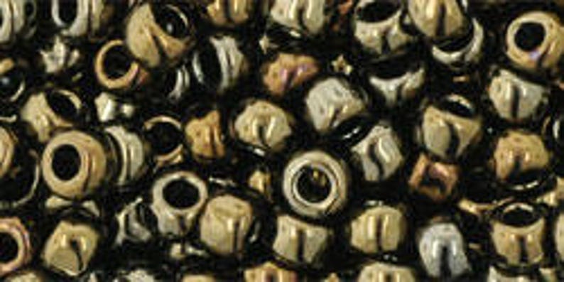 6/0 Round Toho Japanese E Glass Seed Beads #83-Metallic Iris Brown 15 grams 6/0 Round Toho Japanese E Glass Seed Beads #83-Metallic Iris Brown 15 grams