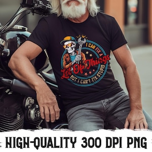 May include: Black t-shirt with a graphic of a skeleton wearing sunglasses and a cap, holding a wrench. The text reads "I can fix a lot of things but I can't fix stupid." The image also includes the text "HIGH-QUALITY 300 DPI PNG".
