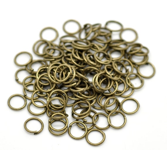 Antique bronze jump best sale rings