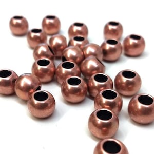100 pcs Shiny Antique Copper Colored Smooth Ball Spacer Beads - 10mm - Large Hole: 4.7mm - Fits European Cords and Paracord!