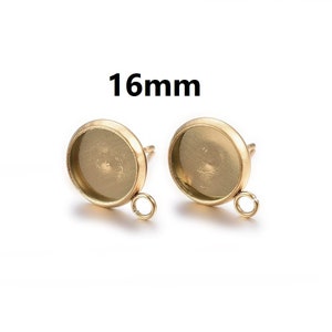 May include: Two gold-toned earring settings with a 16mm round bezel and a jump ring.
