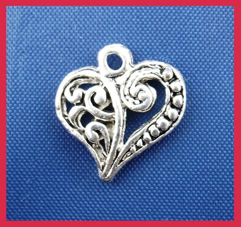 100 pcs. Silver Tone Heart Tibetan Carved Filigree Dots Charms Pendants 13mm x 14mm image 1