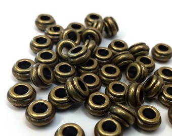 50 szt. antycznych brązowych, paskowanych, METALOWYCH koralików dystansowych Rondelle - 10 mm - Duży otwór: 4,5 mm - Pasują do europejskich sznurków i paracordu!