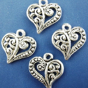 100 pcs. Silver Tone Heart Tibetan Carved Filigree Dots Charms Pendants 13mm x 14mm image 3