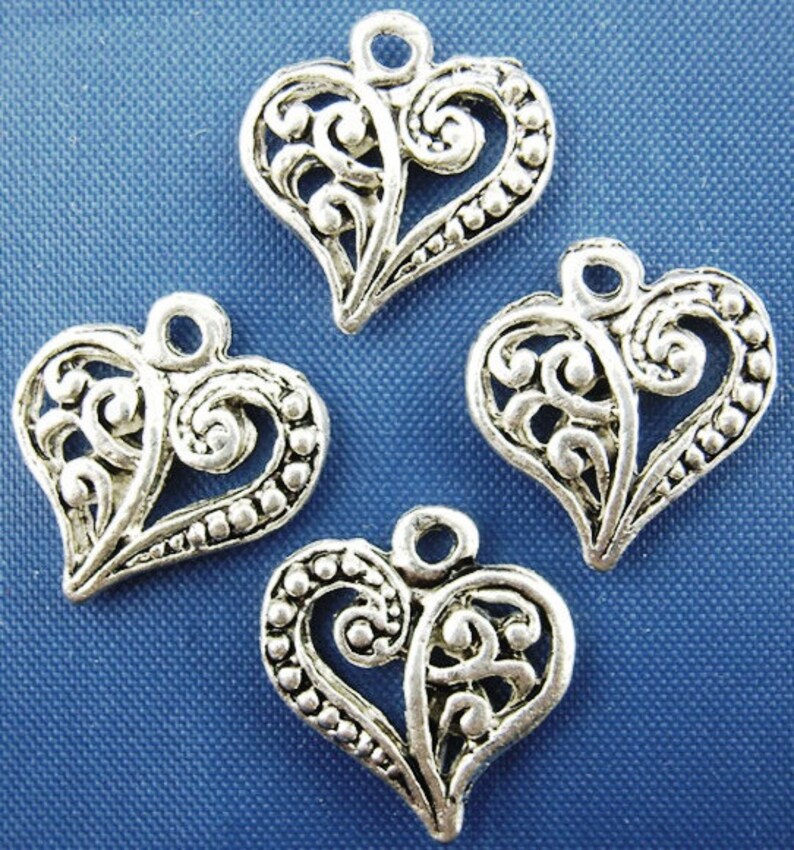 100 pcs. Silver Tone Heart Tibetan Carved Filigree Dots Charms Pendants 13mm x 14mm image 3