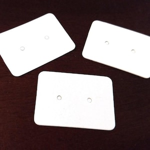 50 pièces Boucles d'oreilles pour bijoux en carton blanc, papier, boucle d'oreille, rectangle, présentation pour cartes, étiquettes, 2 trous, 35 mm x 25 mm (1,38 x 1 po.)