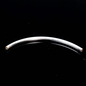May include: A silver, curved, metal tube with rounded ends. The tube is approximately 1.25 cm in diameter and about 7.5 cm long.