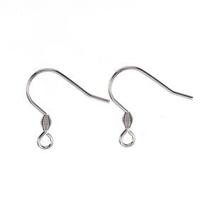 May include: Two silver earring hooks with a small loop at the bottom. The hooks are made of metal and have a smooth finish.