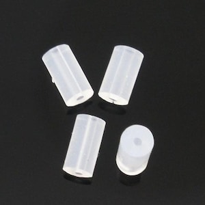 100 piezas (50 pares) de tapones de goma transparentes para pendientes - 4 mm x 2 mm - Forma de tubo - Tamaño del orificio: 0,6 mm imagen 1