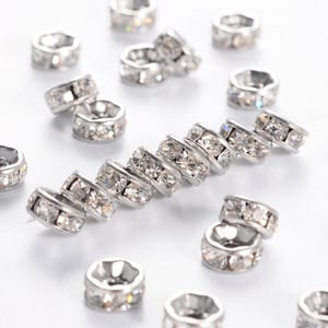 25 pcs. 316 Stainless Steel Clear Rhinestone Rondelle Spacer Beads - Silver Tone - 6mm x 3mm - Hole Size: 1mm - Straight Edges