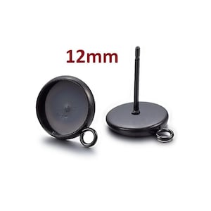 May include: Black metal earring findings with a 12mm round bezel setting. The findings have a post and a loop for attaching a charm or pendant.