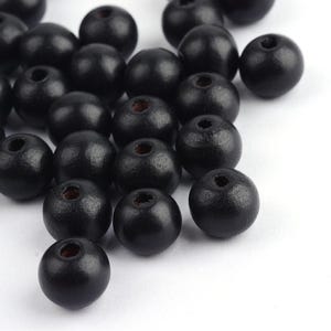 200 pcs Black Wooden Wood Round Spacer Beads - 8mm (0.32") - Hole Size: 3mm - Matte image 1