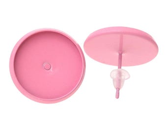 May include: A pair of pink metal earring blanks with a post and butterfly backing. The blanks are round and have a smooth finish.
