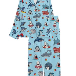 May include: A set of three ceramic mugs with a speckled, matte finish. The mugs are in shades of cream, light gray, and dark gray. Each mug has a simple, minimalist design and a rounded handle.