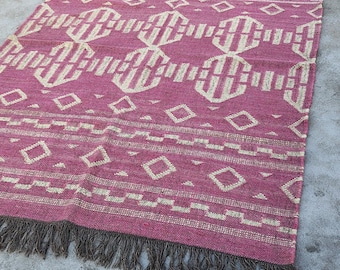 Alfombra Kilim de yute y lana rosa bohemia: Dhurrie geométrica tejida a mano de 1,8 x 2,7 m