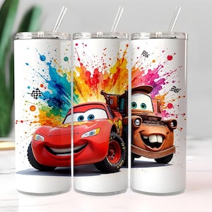 May include: Three white stainless steel tumblers with lids and straws. Each tumbler features a colourful design of characters from the movie Cars, with a vibrant splash of paint in the background. The tumblers are designed for cold beverages.