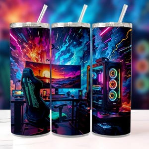 May include: Three stainless steel tumblers with a gaming-themed design. Each tumbler features a vibrant, colorful illustration of a gaming setup with a computer, chair, and monitor. The background is a mix of neon colors.