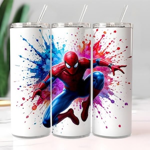 May include: White stainless steel tumblers with a Spider-Man design. The superhero is in his red and blue suit, set against a colourful splash of paint. Each tumbler includes a clear straw and lid.