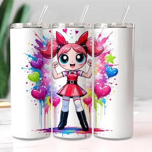 May include: White tumbler with a cartoon character design. The design features a girl in a red dress and black boots, surrounded by colorful hearts and paint splatters. Includes a clear straw.