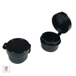 May include: Two black plastic containers with lids. The containers are round and have a smooth surface. The lids are hinged and have a small lip for easy opening.
