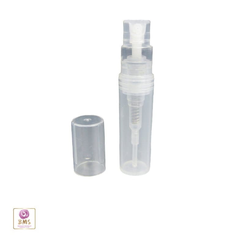 May include: A clear plastic bottle with a spray nozzle and a separate cap. The bottle is designed for holding and dispensing liquids.