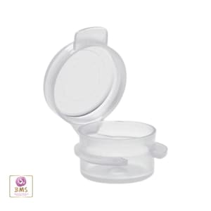 May include: A clear plastic flip-top container with the lid open. The container has a cylindrical base and a hinged lid. The lid is circular and has a small tab for opening. The container is designed for easy access and secure closure.