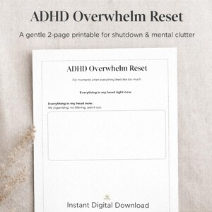 May include: A white printable titled "ADHD Overwhelm Reset" with the text "A gentle 2-page printable for shutdown & mental clutter." The printable includes a section to write "Everything in my head right now."