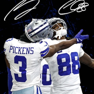 May include: Image of football players in white and blue uniforms, with the number 3 and 88 visible. The players are wearing helmets and gloves. The background is black with blue accents. The image includes white signatures.