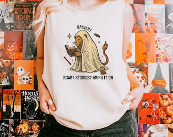 Camiseta sin mangas de fantasma de Bravery House, camiseta de Halloween para amantes de los libros con leones de Comfort Colors, camiseta sin mangas de lectura con fantasma adorable, regalo gráfico acogedor para otoño