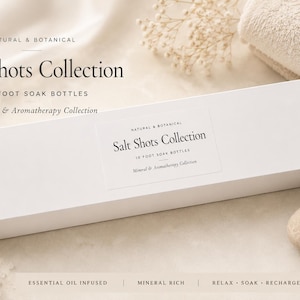 May include: A rectangular white box labelled Salt Shots Collection 10 Foot Soak Bottles Mineral & Aromatherapy Collection. The packaging features the text Natural & Botanical, Essential Oil Infused, Mineral Rich, and Relax, Soak, Recharge.