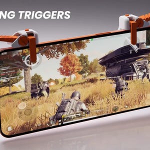 Pode incluir: Um smartphone com moldura laranja exibe um jogo para celular com uma cena de campo de batalha. Gatilhos de jogo laranja e branco estão anexados. O texto "GAMING TRIGGERS" está na parte superior. O logotipo "HEXA" está na parte inferior.