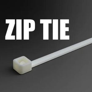 May include: A white zip tie with the text "ZIP TIE" in bold white letters. The zip tie is made of plastic and has a square head. The background is a dark gray color.