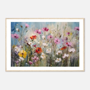 May include: A framed floral painting with a light wood frame. The artwork depicts a vibrant field of flowers in pinks, reds, yellows, and whites, set against a blue and green backdrop. The painting is rendered in a textured, impressionistic style.