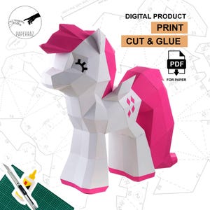 May include: A white and pink papercraft pony with geometric shapes. The pony has a pink mane, tail, and accents. The image includes the text "DIGITAL PRODUCT PRINT CUT & GLUE" and a PDF icon. The pony is a DIY craft project.