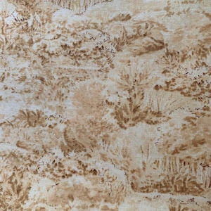 May include: A beige fabric with a brown and white pattern of trees and foliage. The fabric has a subtle texture.