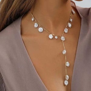 ヴィンテージパールタッセルネックレス：ロングイミテーションパールドロップ、ゴールドトーンチェーン