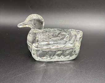 Caja de baratijas/cigarrillos vintage de cristal transparente con forma de pato nadador de L.E. Smith, en excelente estado, estilo retro de mediados de siglo.