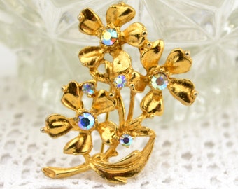 Vintage flower brooch 50s 60s  with blue AB rhinestones gold tone | 1960s flowers floral spray aurora borealis