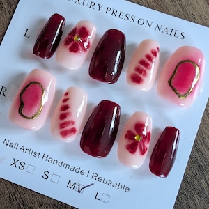 Burgundy chrome blooming nails