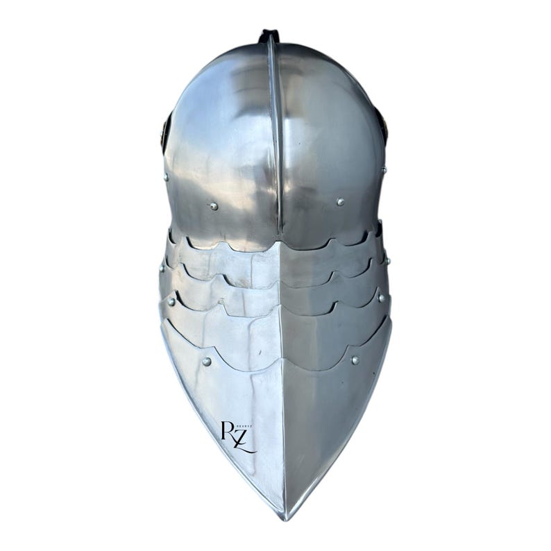 May include: A polished steel medieval-style helmet featuring a rounded dome, a central ridge, and a series of three overlapping articulated neck plates that taper to a point. The lower section displays a small black logo with the letters RZ.